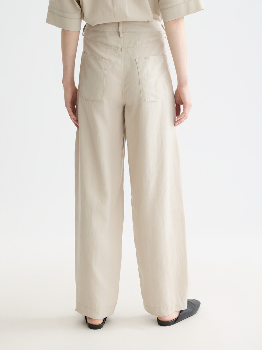 lotus - pantaloni in twill a vita alta con gamba a botte