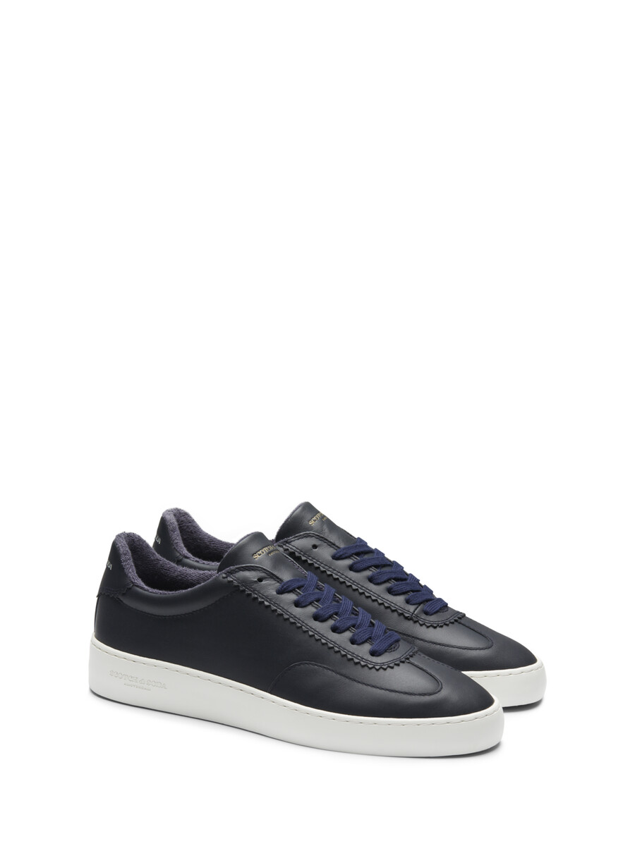 sneaker in pelle plakka