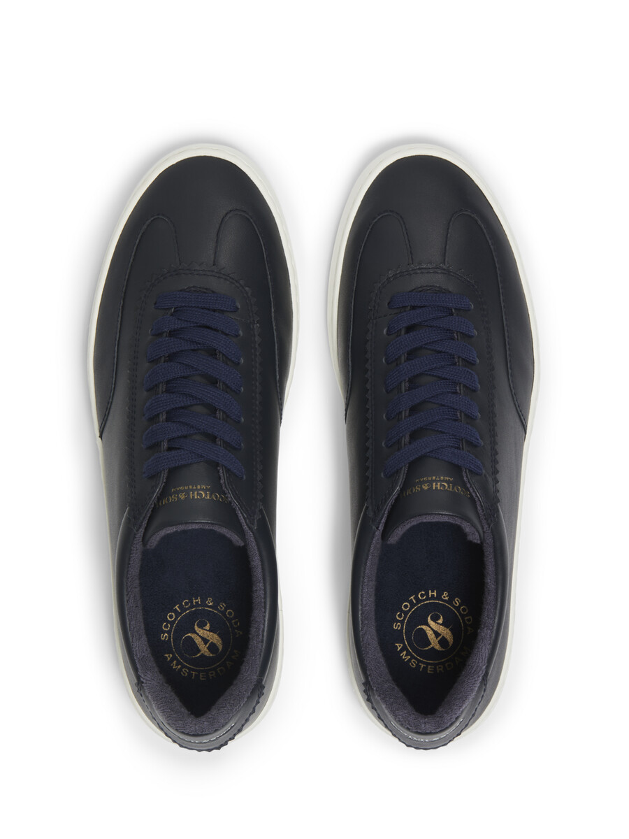 sneaker in pelle plakka