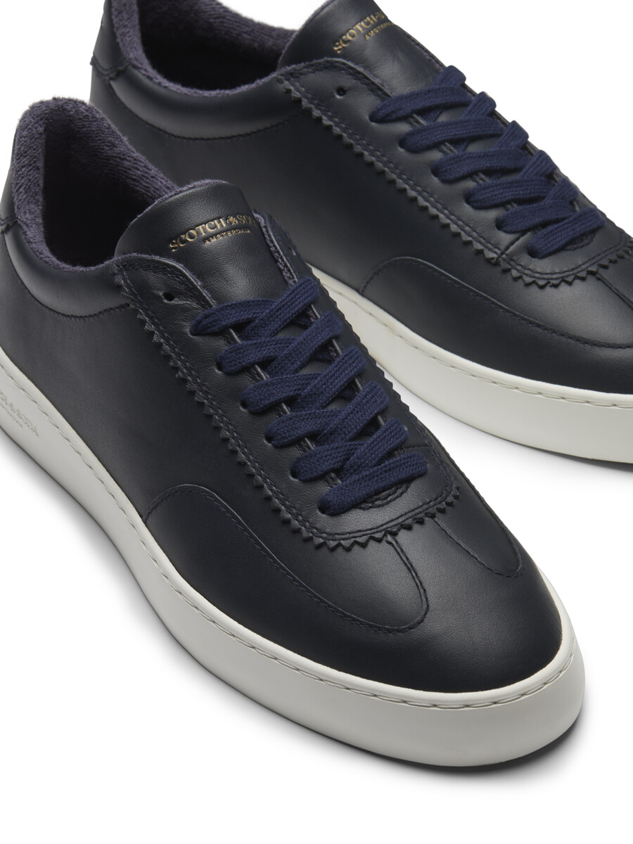 sneaker in pelle plakka